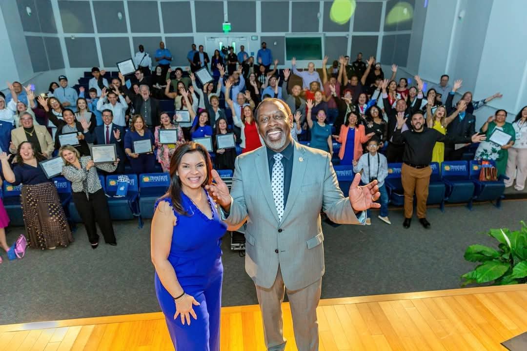 Marthaly with Orange County Mayor Jerry Demings at a community event