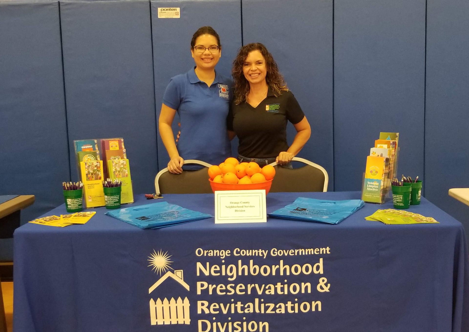 Marthaly with a colleague at the Orange County Neighborhood Preservation and Revitalization Division booth