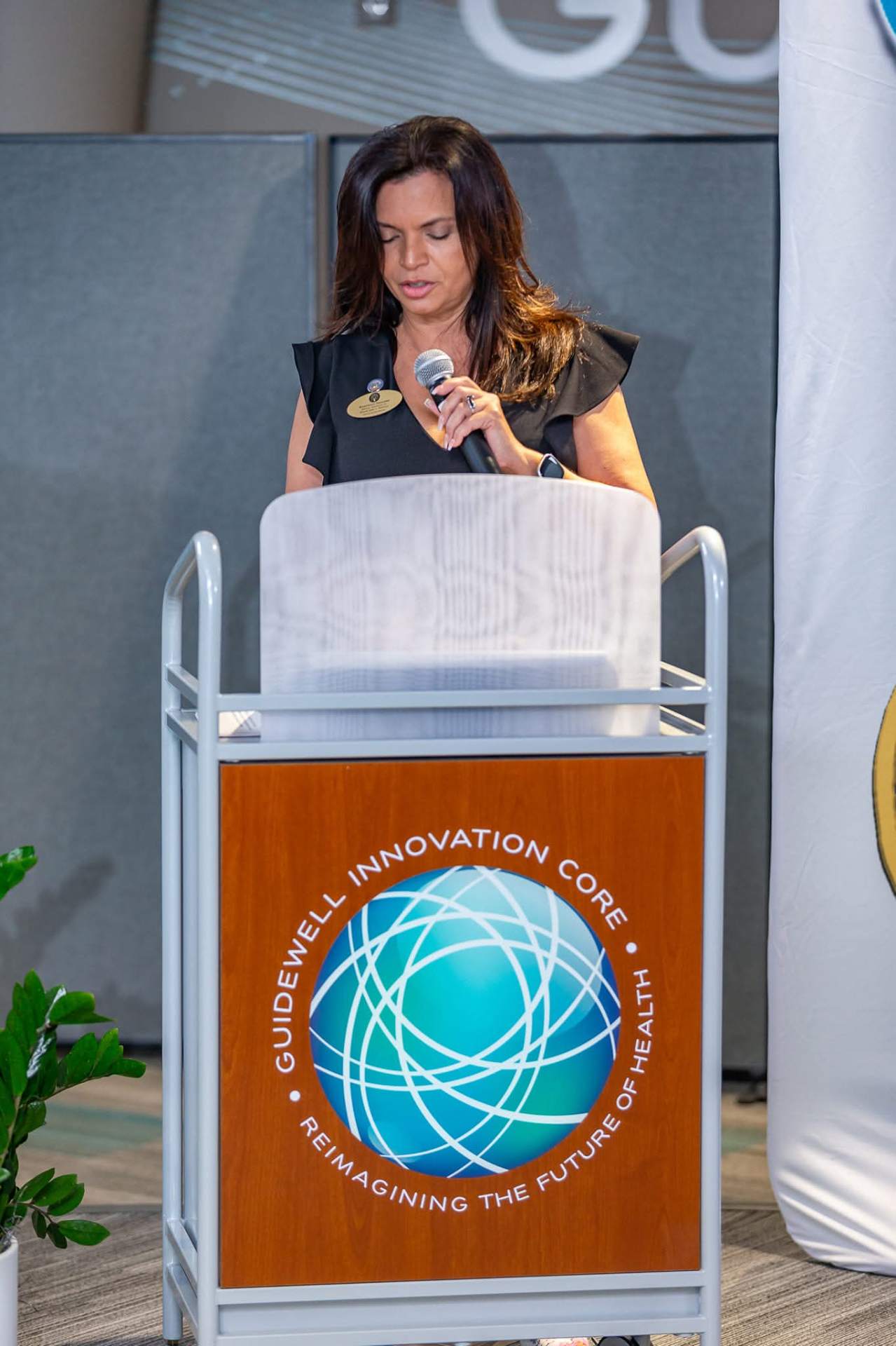 Marthaly speaking at the Guidewell Innovation Core podium